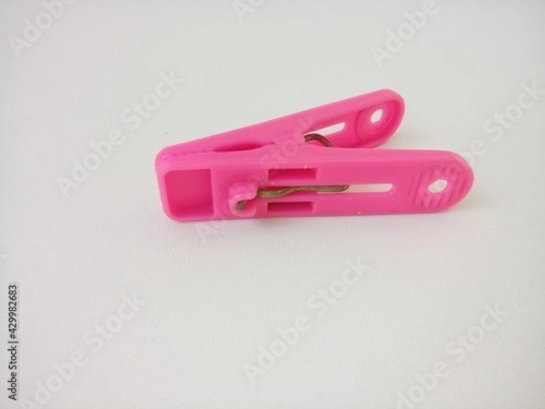 Obraz pink clothes peg
