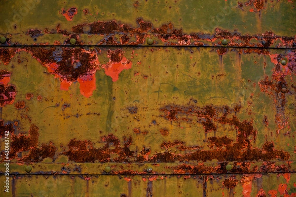 Fototapeta background metal surface with green-red peeling paint