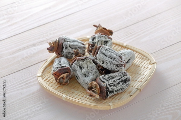 Obraz 白い粉を吹いた干し柿