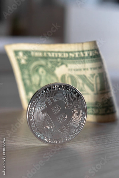 Obraz bitcoin coin on a dollar background