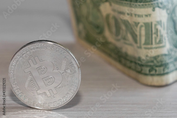 Obraz bitcoin coin on a dollar background