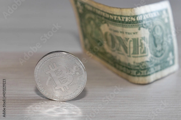 Obraz bitcoin coin on a dollar background