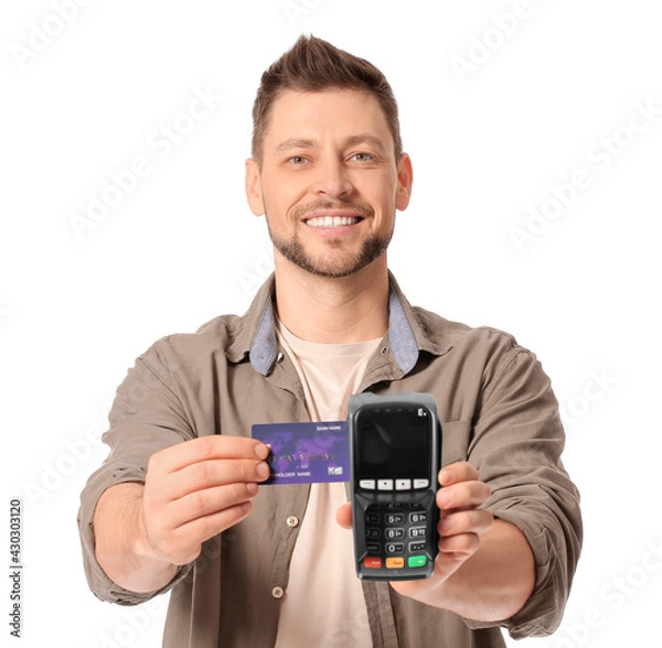 Fototapeta Man with payment terminal and credit card on white background