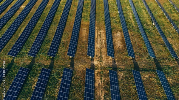 Fototapeta Solar panels in aerial view. Solar panels system power generators from sun