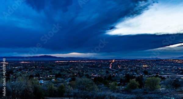 Fototapeta clouds over the city