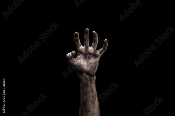 Fototapeta Bloody dirty zombie hand on black background with copy space. Halloween concept. 