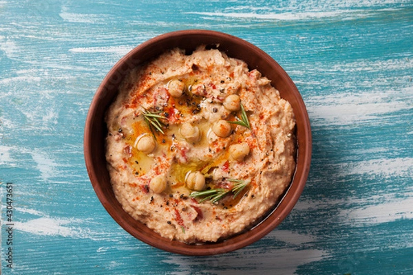 Obraz vegan food. hummus with sun dried tomatoes and smoked paprika