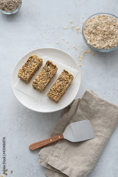 Obraz Home made granola bars made with oats and seeds for breakfast.