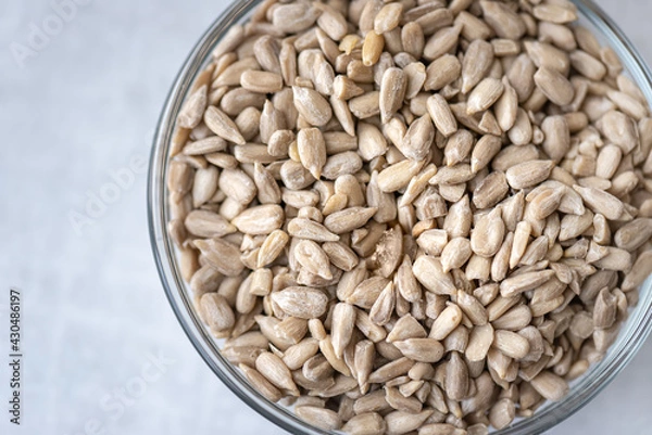 Obraz Macro view of a bowl of sunflower seeds.