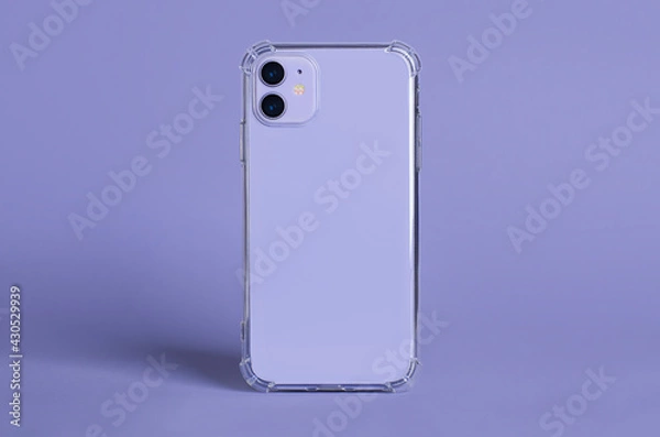 Obraz Purple iPhone 11 in clear silicone case back view isolated on purple background. Phone case mockup