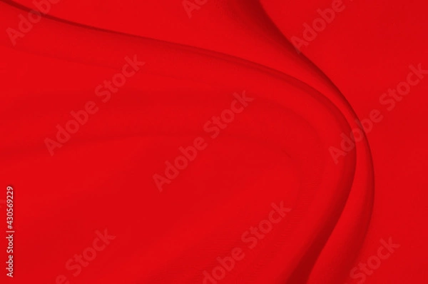 Fototapeta Red fabric sheets background or texture, abstract with waves, Soft focus cloth silk Red