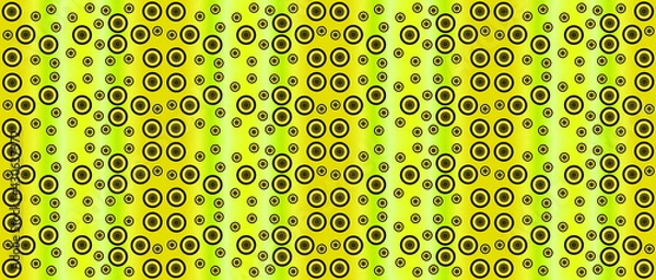 Fototapeta Wheels on a yellow rectangular background. Use for textures and design.