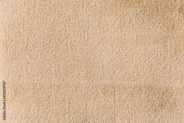 Fototapeta Wheat colour velour textile sample. Fabric texture background