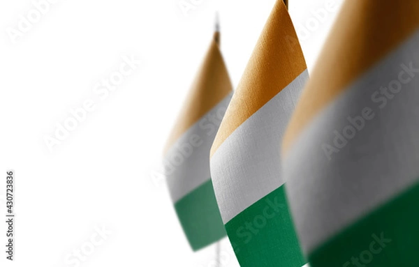 Fototapeta Small national flags of the Cote dIvoire on a white background