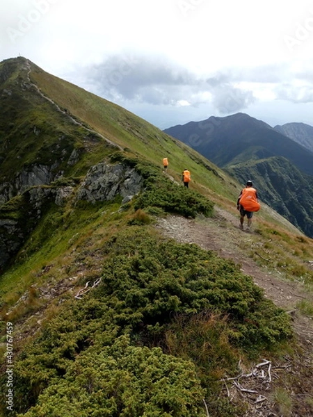 Obraz People Hiking Mountain Trail Path at Foggy Day