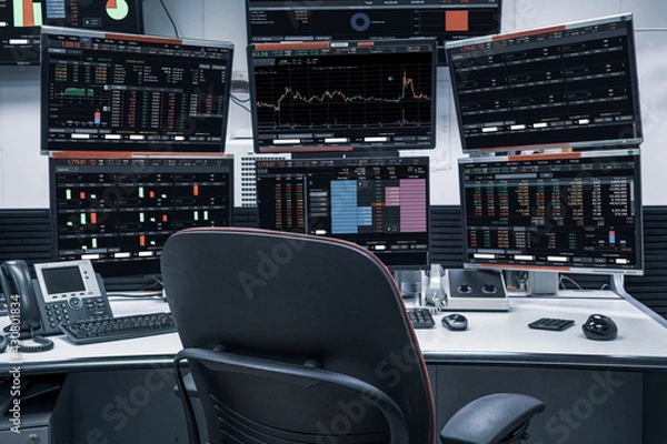 Fototapeta group of stock data monitor analyzing data stock market in monitoring room on the data presented in the chart, forex trading graph, stock exchange trading online, financial investment