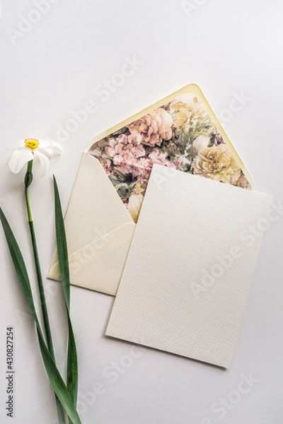 Obraz Mockup card with floral envelope and daffodils 