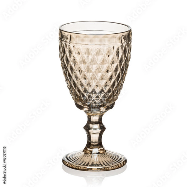 Fototapeta Glass transparent goblet for drinks on a white isolated background.