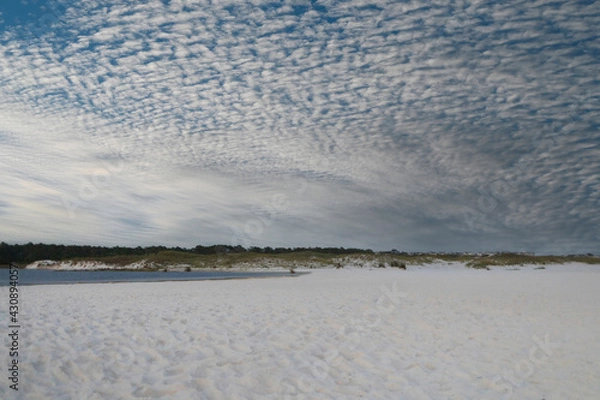 Obraz winter clouds above white sand at gulf beach