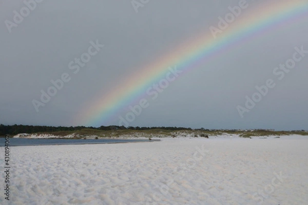 Obraz rainbow over white sand at the beach
