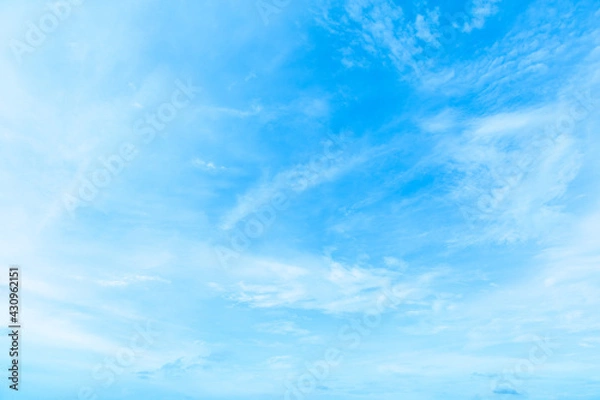 Fototapeta Bright and clear blue sky with clouds in sunny day
