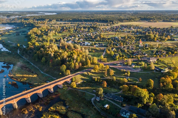 Obraz Long brick bridge, Kuldiga, Latvia. Captured from above.