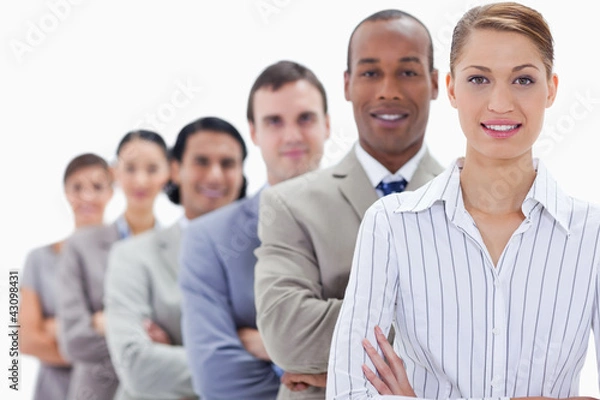 Fototapeta Close-up of a business team crossing their arms in a single line