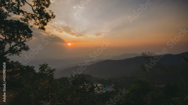 Fototapeta The setting sun.