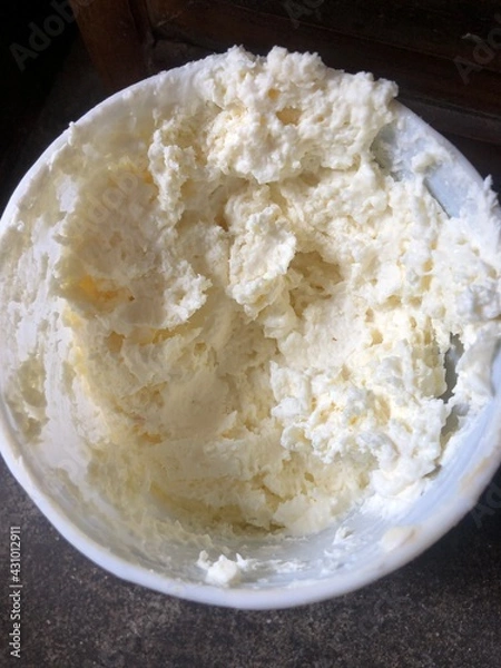 Fototapeta In rural Nepal, butter is made only from yogurt