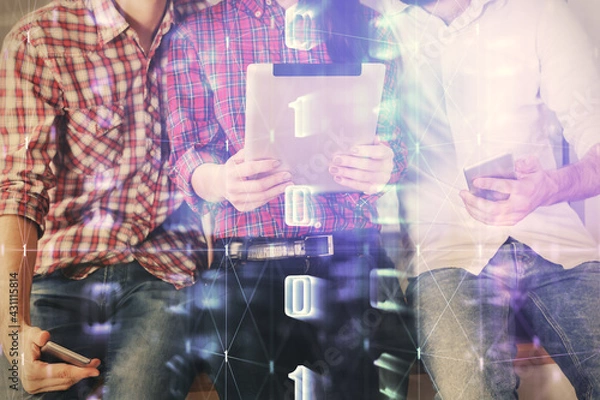 Obraz Double exposure of data theme hologram drawing and man and woman working together holding and using a mobile device.