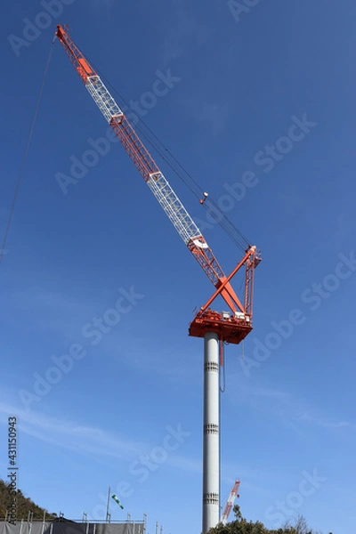 Obraz 日本の建設現場のクレーンと青空
