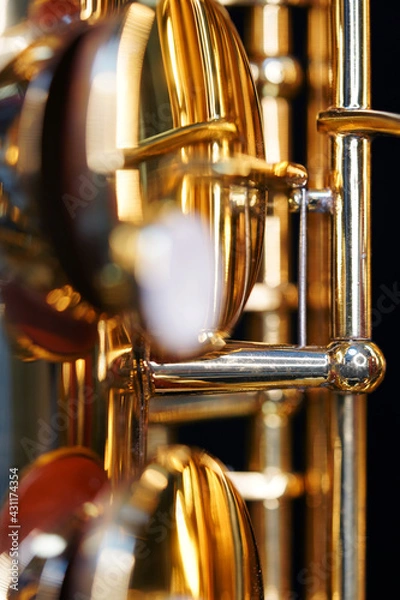 Fototapeta Saxophone jazz instruments. Alto sax isolated. Saxophone music instrument closeup on black                               