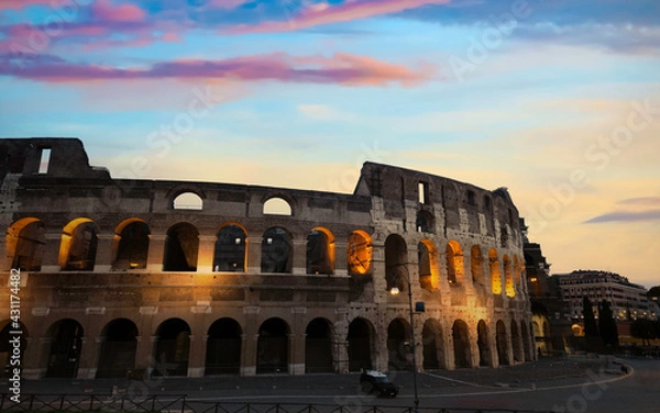 Fototapeta Panoramic view of sunset in Colosseum in Rome, Italy. Rome architecture and landmark. Rome Colosseum is one of the main attractions of Rome and Italy