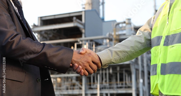 Obraz businessman and engineer oil refinery