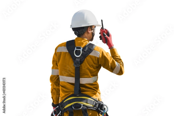 Obraz Workers hand holding walkie talkie wearing equipment for rope access full safety harness isolated on white background