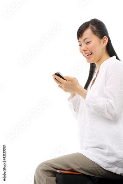 Fototapeta スマートフォンを使う女の子