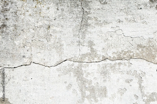 Fototapeta stone wall with broken plaster. background. texture