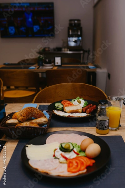 Fototapeta The healthy delicious breakfast served on the table in the cafe. Top view of healthy delicious breakfast served on the table in the cafe.