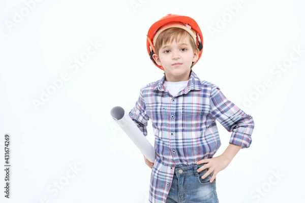 Obraz A little boy dressed for a construction job