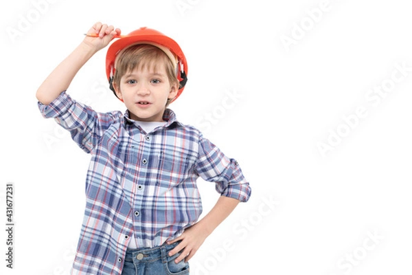 Obraz A little boy dressed for a construction job