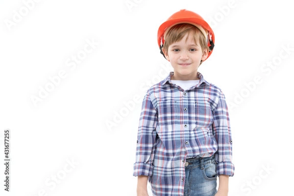 Obraz A little boy dressed for a construction job