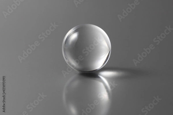 Obraz tranparent ball on a grey background with copy space for your text