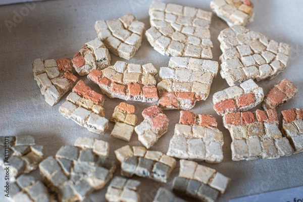 Obraz Broken remains of excavated Mosaic floor pieces from a Roman Villa in West Sussex, England