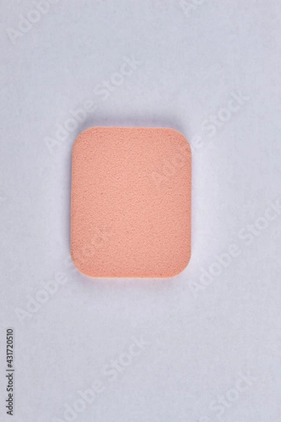 Fototapeta Top view of face powder sponge isolated on white background.