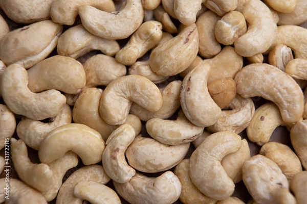 Fototapeta Cashew background horizontal closeup.