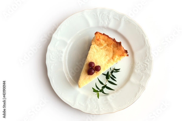 Fototapeta piece of cake on a white plate