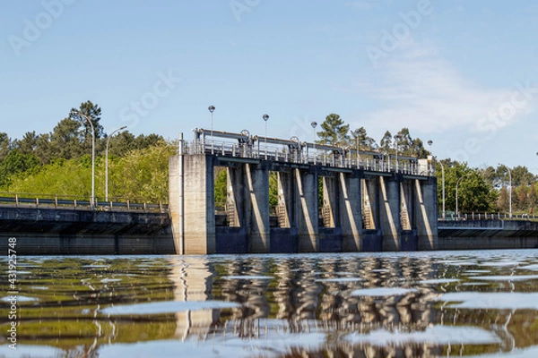 Obraz Virtical rising sluice gates of the dam in Cecebre Coruna Spain