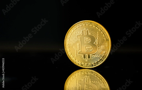 Fototapeta Gold bitcoin coin. Trading on the cryptocurrency exchange. Cryptocurrency Stock Market Concept. Virtual money concept. Mining or blockchain technology.
