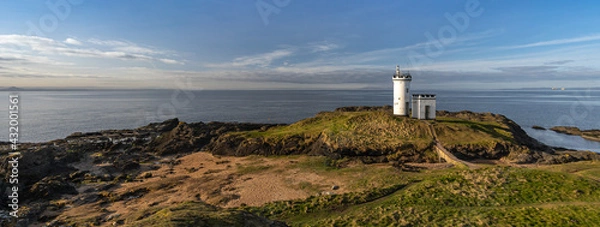 Obraz lighthouse on the shore of the sea