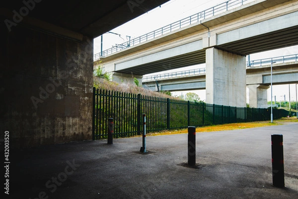 Fototapeta Urban space with a bridge and viaduct.